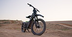 Desert, electric bike and transportation with extreme sports, challenge and endurance with training and nature. Traveling, vehicle and outdoor with competition and eco friendly with sustainability