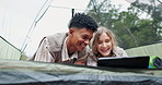 Happy couple, camping and laughing with tablet in tent for funny movie, series or outdoor entertainment in nature. Man and woman relaxing or enjoying comedy show, streaming or technology in the woods