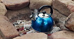Camp, kettle and smoke or steam outdoor, vapor with heat in fire pit for boiling water or tea to drink. Adventure, travel and pot for warm beverage or cooking, campfire and vacation in nature park 