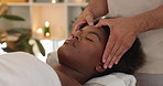 Spa, hands and black woman with face massage for relax, skincare or beauty with dermatology routine. Health, calm and masseuse with African female person for facial treatment at luxury holiday resort