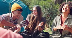 Friends, campsite and outdoor with guitar for singing with music, relax or nature on vacation in countryside. Men, women and people with song by tent for art, holiday or performance in bush at picnic