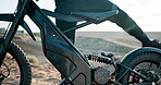 Biker, motorbike and man with chair in outdoor training to start for extreme sports, safety and practice on sand. Seat, ready and driver with gear for dunes, race or cycling in challenge on holiday
