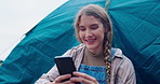 Camping, phone and woman in tent in nature on adventure, holiday and vacation outdoors. Morning, happy and person on campsite with smartphone for social media, online post and travel update in Sweden