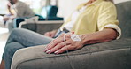 Hands, healthcare and senior woman with iv drip in a hospital for cancer, treatment or chemotherapy. Catheter, fluid and elderly female patient at a wellness clinic for kidney dialysis treatment