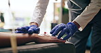 Nurse, needle and plaster with surgery hands in gloves at a hospital with healthcare infusion. Medicine, clinic and medical support with patient and doctor helping with blood sample for treatment