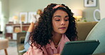 Woman, tablet and couch for browsing, scroll and social media with online connection. Person, email and reading internet article in lounge, living room and sofa with streaming or ebook website