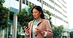 Asian woman, phone and employee for coffee in city, planning and check email for networking. Female person, latte and app for conversation in urban town, website and lawyer for contact or commute