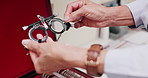 Hands, glasses and person with choice, health and eye care with optometry and product with clear vision. Doctor, business owner and employee with eyewear and frame store with ophthalmology and retail