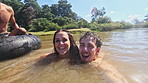 Selfie, swimming and couple in lake for fun on holiday, summer vacation and weekend. Live streaming, camp and portrait of man and woman on adventure for content creation, vlog and travel influencer