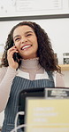 Phone call, restaurant and woman waitress at a counter for online order, menu or food service at startup. Small business, cafe or lady server with smartphone conversation for customer service or info