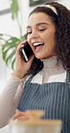 Restaurant, phone call and woman waitress at a counter for online order, menu or food service at startup. Small business, cafe a female server with smartphone conversation for customer delivery info