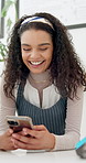 Woman, phone and waitress in cafe typing meme, chat or social media post at counter in small business. Smile, smartphone and server at coffee shop checking email, online order or mobile app at store