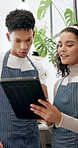 Tablet, team and people in restaurant for training, help and online for orders, stock and inventory list. Collaboration, discussion and man and woman on digital tech for coffee shop, cafe and store