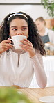 Woman, coffee shop and happy for conversation with friends for reunion with memory, drink and relax at table. Girl, people and chat for gossip with latte, espresso or cappuccino at cafeteria in Paris