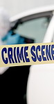 Crime scene, tape and police investigation of car with forensic photography for evidence and research. Closeup warning, investigation and murder, violence or accident with problem solving or analysis