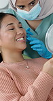 Healthcare, dentist and woman with mirror for consulting, oral hygiene and tooth examination. Dentistry, clinic and person with inspection at appointment for dental care, teeth whitening and advice