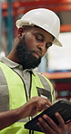 Black man, tablet and logistics in warehouse with inventory
for supply chain, quality control or online stock check. Manufacturing, helmet and inspection with digital checklist for order distribution