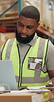 African man, laptop and logistics in warehouse with distribution for supply chain, quality control or happy with online stock. Manufacturing, worker or inspection with digital checklist for inventory