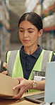 Woman, box and scan with laptop in warehouse with distribution, package and delivery for supplier. Logistics, employee and smile with product in manufacturing, storehouse or wholesale in pov.