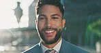 Face, happy or businessman with city, commute or confidence for work by buildings. Proud employee, smile or street with cbd or portrait with an entrepreneur, urban career or job at corporate in town