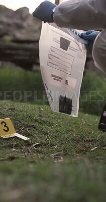 Crime scene, evidence markers and forensic investigation in woods with ...