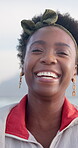 Black girl, beach and laughing for vacation, portrait and happy for travel, holiday and nature of water. Sea, morning and outdoor for adventure, peace and person in Hawaii, getaway and trip in island