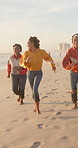 Girl, friends and happy running on beach for bonding, travel adventure and relax on holiday together. Fun, race and group of women on ocean vacation with energy, games and playful weekend in nature