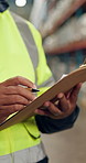 Hands, factory and man with clipboard, inspection and industrial with quality assurance, worker and supply chain. Closeup, employee or consultant with documents, checklist for stock and writing notes