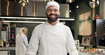 Man, face and chef in kitchen or laughing in culinary restaurant for funny joke, customer service or hospitality. Male person, hat and happy for fine dining cuisine or working, smile or professional