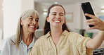 Selfie, senior mother and daughter on sofa with smile for memory, bonding and profile picture in home. Women, photography and family on lounge couch with love, connection and post on social media app