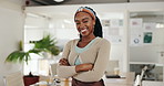 African woman, arms crossed and face at startup with smile, confidence or leadership at small business. Person, employee and happy in portrait with pride in office at creative media agency in Chicago