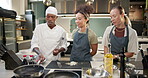 Chef, cooking class and pan in kitchen for learn, teacher and food for professional skills. Restaurant, fry or culinary student with oil for saute, onion or vegetables for prepare with recipe cuisine
