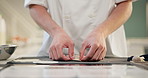 Hands, food and chef with dumplings in kitchen for gourmet meal prep at luxury restaurant. Cooking, fine dining and male culinary worker fold pastry for Chinese cuisine dinner at hospitality diner.