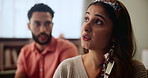 Couple, angry and conflict with fight in home for divorce, disagreement or mistake in marriage. People, stress and frustrated for cheating, betrayal or jealousy in living room with toxic relationship