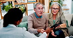 Senior couple, lawyer and tablet for talk in home, savings and clients for pension fund advice. Old people, online and agent for digital paperwork on couch, meeting and evaluation of asset management