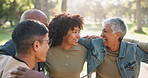 Park, happy people or volunteers in huddle for support, community project or donation for nature sustainability. Humanitarian, group or senior friends hug with smile, charity service or NGO together