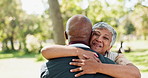 Happy, love and senior couple hug in a park for weekend date, reunion  or bonding with conversation in nature. Hello, welcome and old people embrace in a forest visit with care, trust and support 