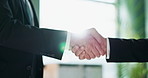 Businessman, handshake and meeting with partnership for b2b, deal or agreement together at office. Closeup of man, colleagues or employees shaking hands for teamwork, hiring or welcome at workplace