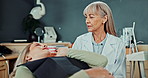 Dentist, woman and patient in consultation for teeth, dental or medical service with support, assessment or advice. Orthodontist specialist or doctor with client for discussion of mouth or tooth care