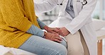 Holding hands, closeup or doctor with patient in consultation for healthcare advice or checkup at hospital. Support, cancer therapy or medical worker talking to person in appointment for medicare