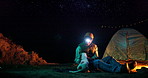 Night, camping and man with dog at tent to relax on outdoor adventure with torch, sky and mockup. Dark, headlamp and person at campfire with puppy, Jack Russell and pet bonding together in nature