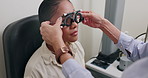 Ophthalmology, hands and woman with trial lens for eye exam, health and wellness in optical store. Optometry, vision and optician with female patient with prescription testing at consultation in shop.