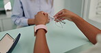 Glasses, optician and hands of person at shop for choice, decision or client buying. Closeup, ophthalmology or customer at store with lens for spectacles, frame or eyewear on sale for healthy vision