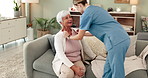 Senior woman, caregiver and help with clothes on sofa, ready and happy for conversation in morning. Nurse, carer and elderly patient with cardigan, support and talk on lounge couch in retirement home