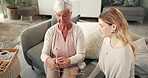 Mature mom, daughter and home with knitting lesson, teaching and bonding with care. Women, living room and sofa with support for family heritage, culture and skill with support and care with wool