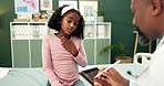 Black man, doctor and consulting child with tablet for throat infection, heart burn or chest pain at clinic. African, male person and little girl in medical consultation for exam, virus or diagnosis