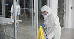 Professional, office and cleaning service and disinfect, mopping and sterilization for health care. Germ, protection and virus with safety suit for chemical exposure, fumigation team and hygiene mask