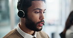 Office, talking and man with headset in call center as operator, discussion or telecommunication. Professional, career or consultant for advice, support or answer questions for customer service