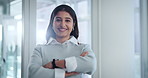 Indian woman, face and arms crossed in office, smile and ambition for career opportunity. Female person, portrait and professional for startup company, workplace and positive or confident at agency