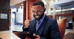 Business, tablet and excited man with winner fist celebration in a lobby for lottery, prize or competition giveaway. Hotel, app and happy male concierge with success, hands or digital alert for bonus